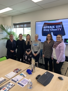 SPEAK UP! Stay ChatTY presenter gathered with Synectic community committee and staff